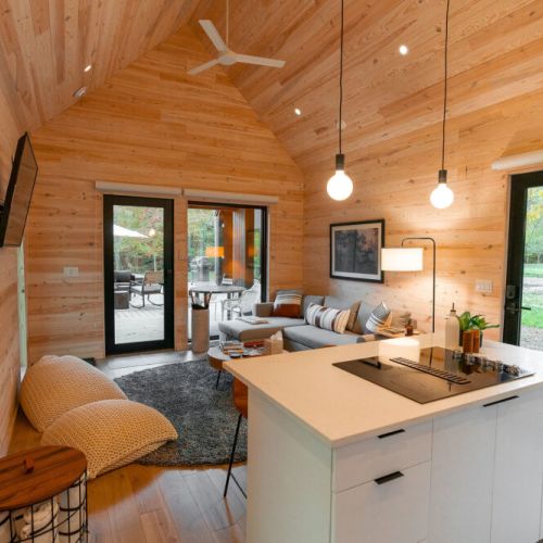 Interior of Eat & Play - your Kitchen and living room area looking out towards the deck.