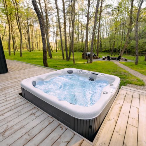 Recessed Masterspa Getaway Hot Tub overlooking the Pine forest.