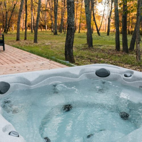 Recessed Masterspa Getaway Hot Tub overlooking the Pine forest.