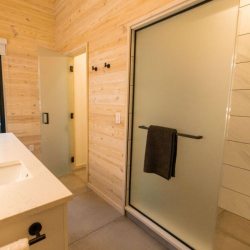 Rest & Refresh - bathroom features a walk-in rain shower head.